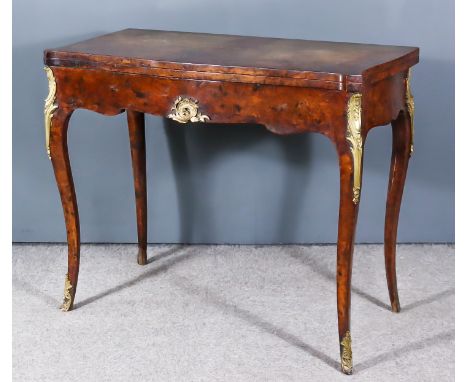 A 19th Century French Burr Walnut and Gilt Metal Mounted Rectangular Card Table, of serpentine outline, green baize lined fol