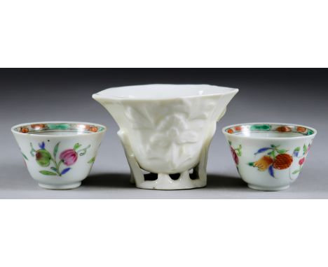 A Chinese Blanc-de-Chine Porcelain Moulded Octagonal Stem Cup, Kangxi Period, 2.125ins (5.3cm) high, and a pair of polychrome