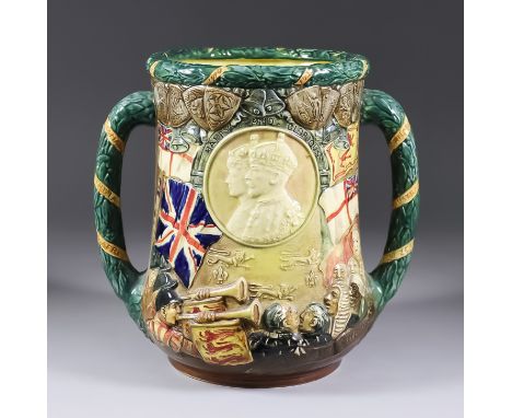A Royal Doulton Limited Edition Loving Cup with Double Portrait of George V and Queen Mary, 1935, celebrating twenty-five yea