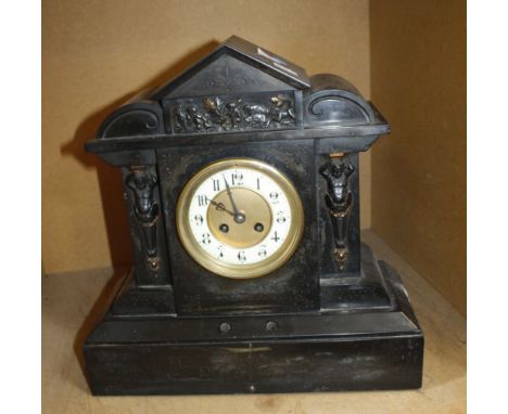  A black slate pediment mantel clock  , with frieze of figures, 39cm high 