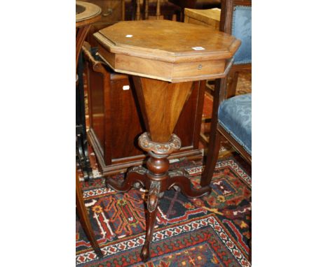  A 19th Century walnut hexagonal work table  , an Edwardian mahogany jardiniere and a mahogany standard lamp 