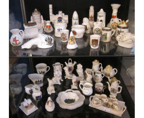  A quantity of crested ware  , to include Arcadian china, Goss and some silver mounted examples  