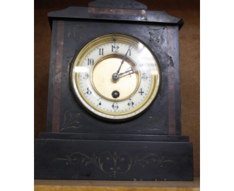  A late 19th/ early 20th Century black slate and red marble mantel clock  , 24cm high 