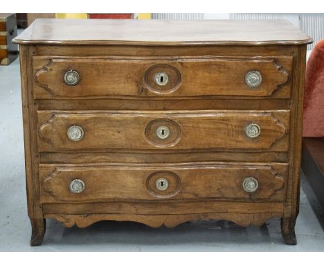 COMMODE, 18th century French Louis XV walnut of serpentine outline with three long drawers and carved stile supports, 90cm H 