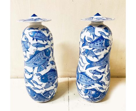 GINGER JARS, a pair, Chinese style blue and white ceramic with carp decoration, 44cm H x 17cm W. (2)