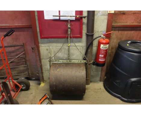 A cast iron garden roller 