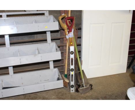 A quantity of long handled gardening tools