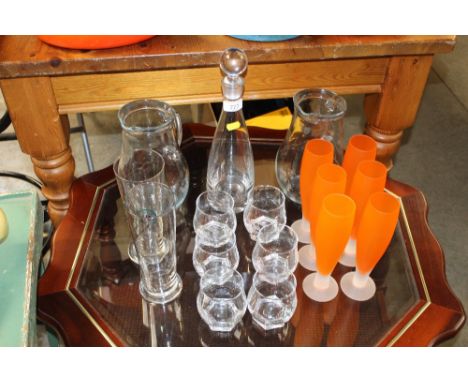 A quantity of glassware to include decanter and stopper, jugs, coloured drinking glasses etc. 