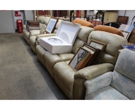 A three piece suite comprising of a three seater settee and a matching two seater settee and matching armchair