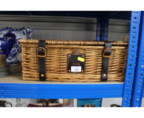 A Harrods picnic hamper lacking contents