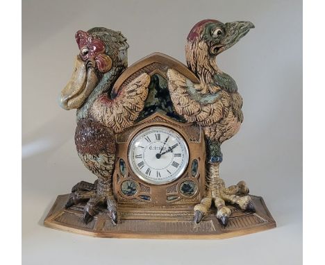 A Colbridge (an Associate company of Moorcroft Pottery) stoneware Caught in Time mantle clock , with dodo birds each side  , 