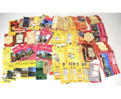 A collection of folding maps. Including examples by Michelin and Ordnance Survey