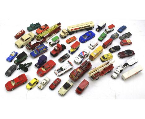 An assortment of playworn diecast. Including cars, commercial and industrial vehicles by Matchbox, Corgi, Maisto, etc