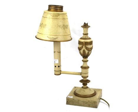 A 20th century metal lamp. Painted in gilt and cream and featuring an urn, with matching shade, H40cm (excluding fitting)