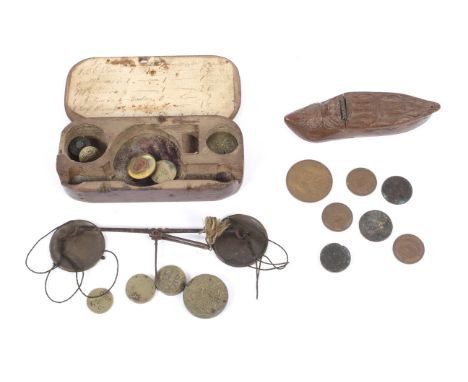 An 18th century cased set of travelling coin scales. With associated weights, together with a carved wooden snuff box in the 