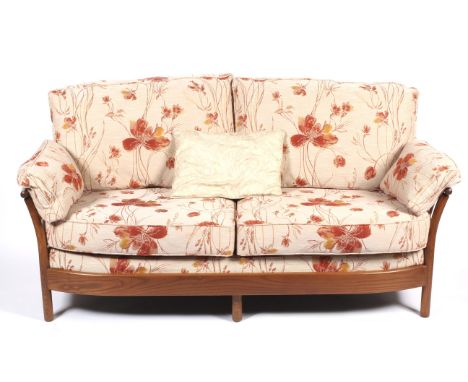 A high back Ercol four piece lounge suite. Comprising a 3 seater, 2 seater sofa of similar style (posssibly in the style of E