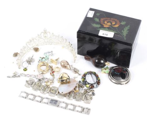 Assorted costume jewellery. To include a bracelet, compact, wristwatch etc