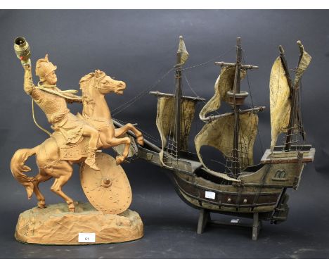 A 20th century gilt metal Marley horse table lamp and a model of a boat. The boat mounted on wooden stand, H47cm, The Marley 