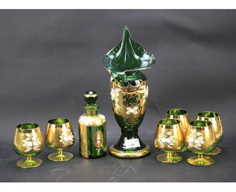 A Bohemia crystal decanter, cup and vase. In green with gilt decoration, some in the original boxes, vase H32cm