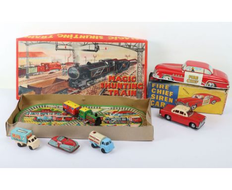 Boxed Wells Toys Tinplate Friction Drive Fire Chief Siren Car, lithographed red/white car, 28cms-11” L in excellent original 