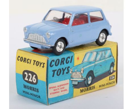 Corgi Toys 226 Morris Mini Minor, pale lilac blue body, red interior, shaped spun wheel hubs, in mint original condition, yel