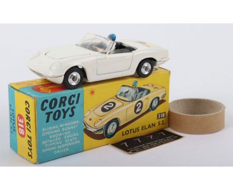 Corgi Toys 318 Lotus Elan S2 white body, ‘Ive got a tiger in my tank’ decal on boot, black interior with driver, spun hubs, c