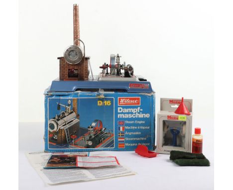 Wilesco D16 Steam engine, boxed steam engine with boiler, operating single cylinder and spoked flywheel and governor, conditi