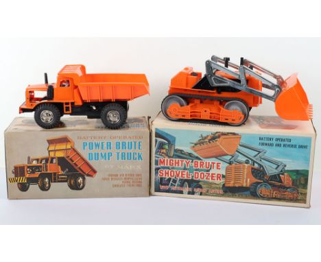 Boxed Marx Toys Mighty Brute Shovel Dozer, orange plastic body, black rubber tracks tinplate base, battery operated untested 