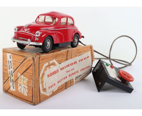 Victory Industries Morris Minor 1000, battery operated fitted with push button remote control, red plastic body, aluminium tr
