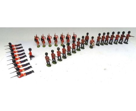 Britains Foot Guards set 34, Grenadier Guards 'Volley Firing' with fixed arm bemedalled Officer and pigeon toed Drummer (Cond