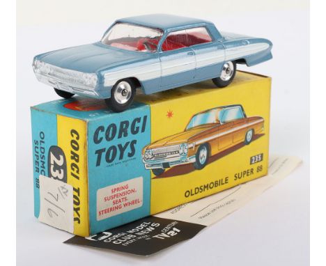 Corgi Toys 235 Oldsmobile Super 88, metallic steel blue, white side flash, red interior in mint original condition, blue/yell