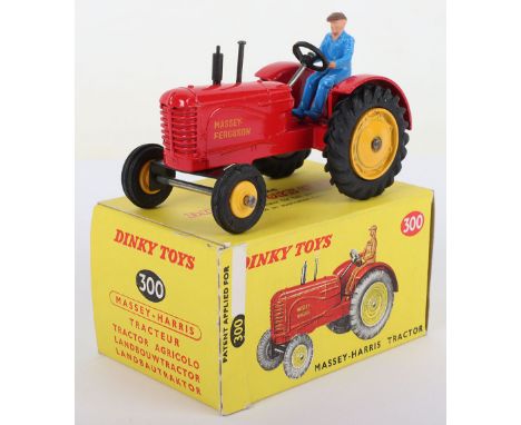 Dinky Toys 300 Massey-Harris Tractor, red body later renamed ‘Massey- Ferguson’  yellow metal rear wheel hubs, front plastic 