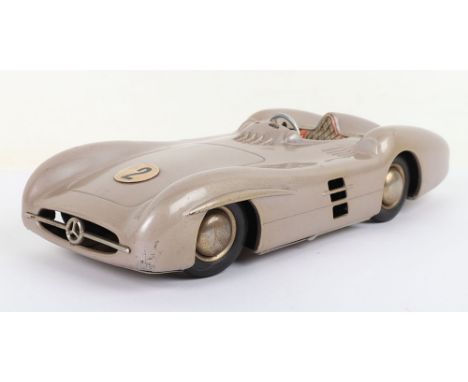 JNF (Western Germany) Tinplate Mercedes Racing Car, battery operated in working order, no’2’ rubber tyres, pale metallic brow