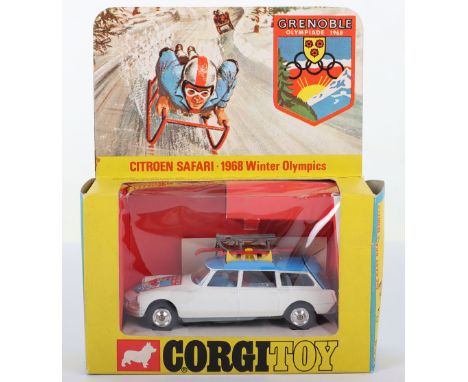 Corgi Toys 499 Citroen Safari Grenoble 1968 Olympics, white/blue body, yellow roof rack, toboggan with figure, skier, skis an