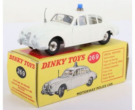 Dinky Toys 269 Jaguar Motorway Police Car, mat white body, cream interior, two policeman figures, aerial, blue plastic roof l