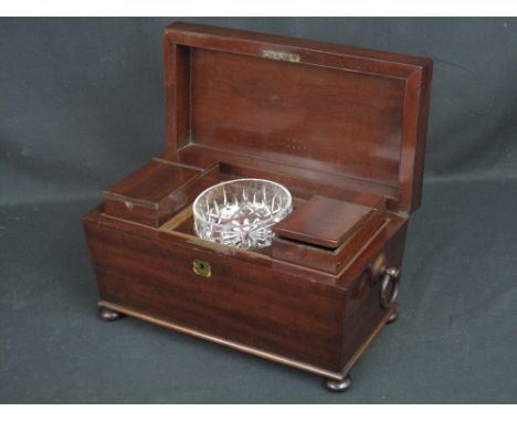 19th CENTURY MAHOGANY SARCOPHAGUS TEA CADDY, having two compartments to the interior with fitted cut glass circular bowl, sta