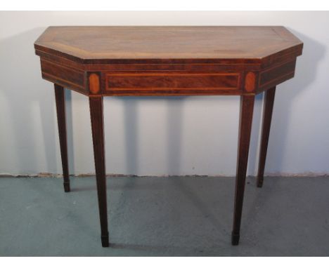 EARLY 19TH CENTURY MAHOGANY SATIN WOOD BANDED HALF OCTAGONAL FOLD-OVER CARD TABLE, the top with three rows of rosewood and sa