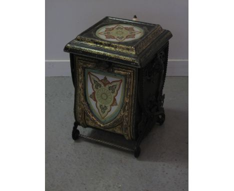 VICTORIAN BLACK JAPANNED AND GILDED PURDONIUM COAL BOX having gilded inset glass panels and being of an ex-frame with hinged 
