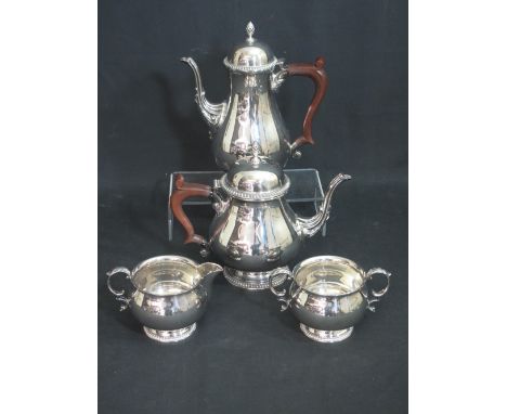 ELIZABETH II SILVER FOUR PIECE TEA AND COFFEE SET, comprising coffee pot, tea pot, cream jug and sucrier of baluster form wit