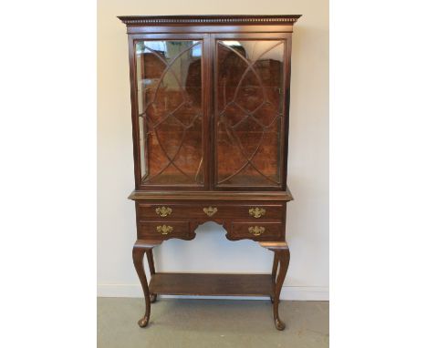 EARLY 20th CENTURY MAHOGANY CHINA DISPLAY CABINET in Georgian style having moulded dental cornice astragel glazed doors with 