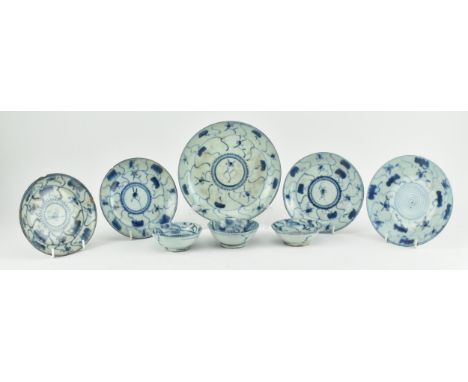 A collection of five Qing dynasty blue and white ceramic pieces. The lot comprising a seven inch plate, one six inch plate, t