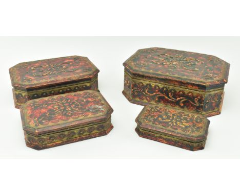 A graduating set of Kashmir Indian early 20th century painted &amp; brass mounted jewellery boxes in a papier mache manner. E