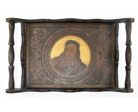 A Iberian Peninsula 19th century Renaissance style mahogany breakfast tray featuring central portrait depiction of a Renaissa