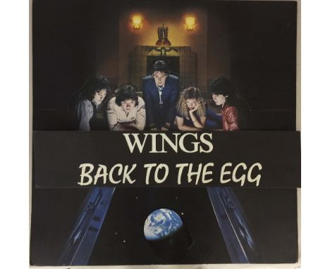 BACK TO THE EGG SHOP DISPLAY. An original, two part (the text is removable) fold out cardboard promotional display for Wings'