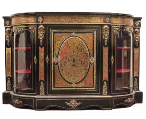 A 19th Century French red boulle Credenza, the shaped top over a brass inlaid decorated freize, a single ormolu mounted centr