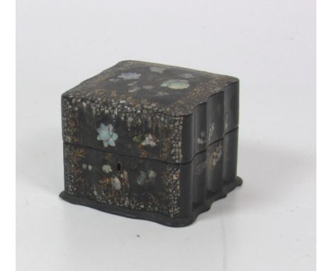 A small Victorian painted and mother-o-pearl inlaid papier mache Scent Decanter Box, with four original cutglass bottles; and