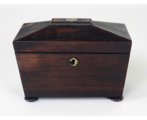A small early Victorian rosewood casket shaped Tea Caddy, with inset mother-o-pearl medallion inscribed 'From Johnny Nove. 18