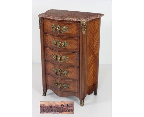 A 19th Century French style kingwood and marquetry Commode, with marble top, gilt metal mounted sides and decorative rococo s