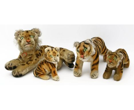 4 Raubkatzen, Steiff. Verschiedene Ausführungen. Ohne ID's. Bespielt bzw. eingestaubt. 50er/60er Jahre. H. bzw. L. 10 bis 30 
