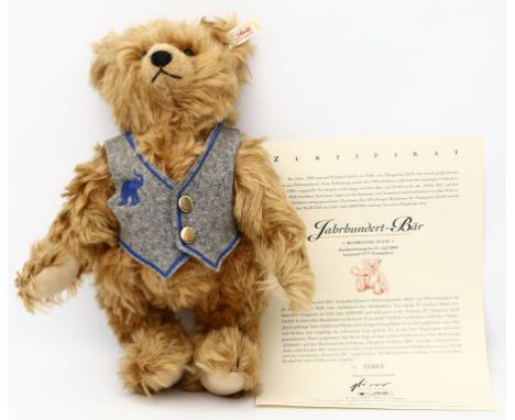 Limitierter "Jahrhundert"-Bär, Steiff. Rotblonder Mohair. Mit K und F. Ex. 665/9.777 aus dem Jahr 2000. H. 33 cm. Beigegeben: